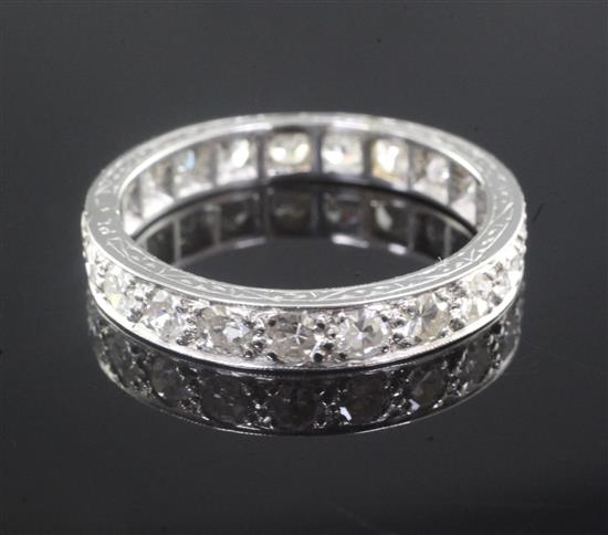 A platinum and diamond full eternity ring, size N.